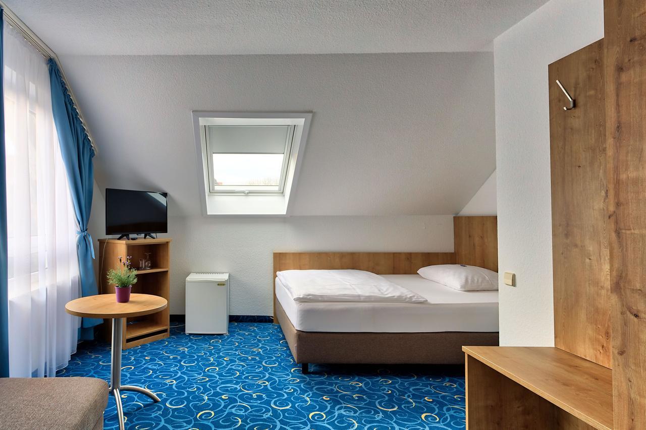 Appartis - Hotel Am Stadtpark ซินเดลฟิงเงน ภายนอก รูปภาพ